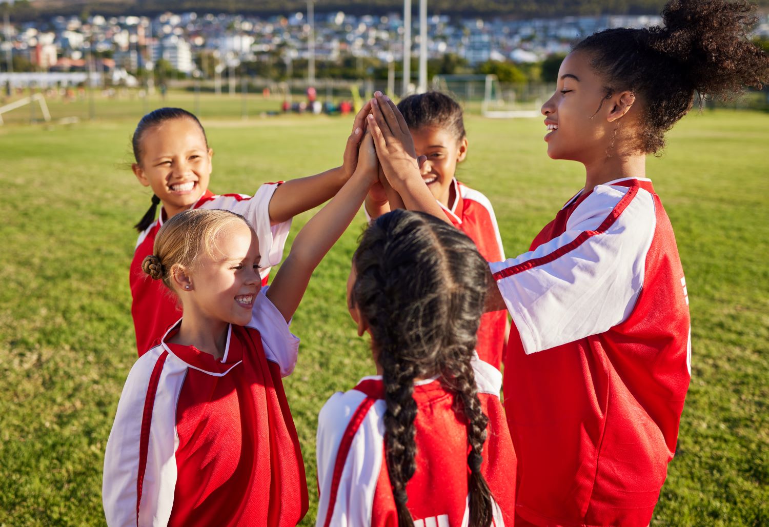 Kids football team celebrating